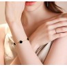 PULSEIRA TREVO DE QUATRO FOLHAS COM PEDRA ONIX - AÇO INOXIDÁVEL
